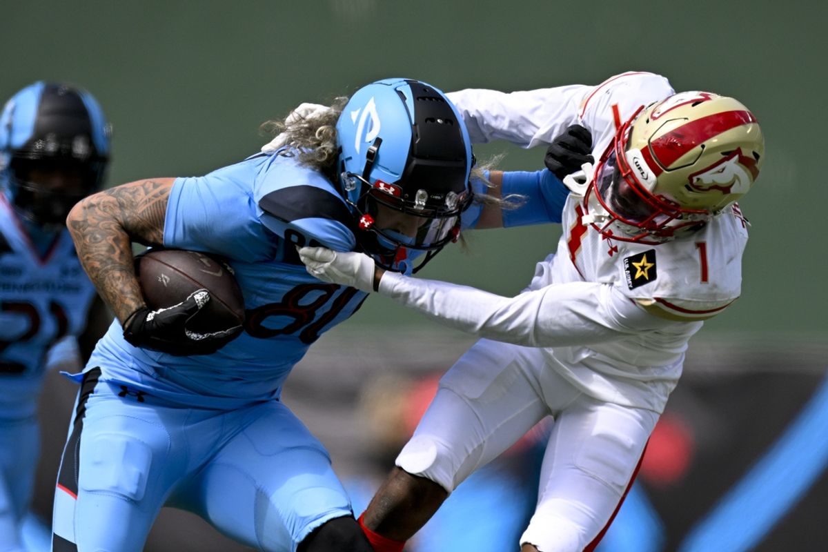 Mar 30, 2024; Arlington, TX, USA; Birmingham Stallions defensive back Chris Jackson (1) tackles Arlington Renegades tight end Sal Cannella (80) during the second half at Choctaw Stadium. Mandatory Credit: Jerome Miron-USA TODAY Sports