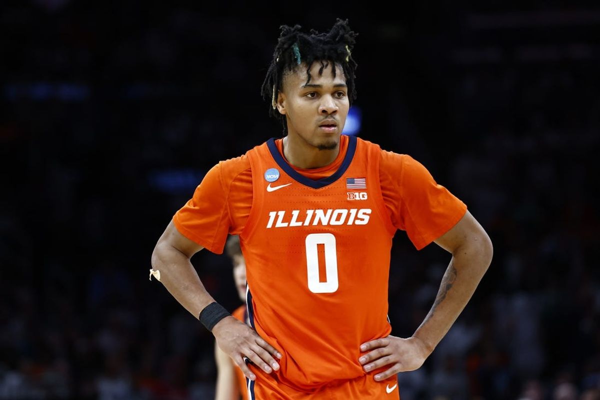 Mar 30, 2024; Boston, MA, USA; Illinois Fighting Illini guard Terrence Shannon Jr. (0) reacts against the Connecticut Huskies in the finals of the East Regional of the 2024 NCAA Tournament at TD Garden. Mandatory Credit: Winslow Townson-USA TODAY Sports