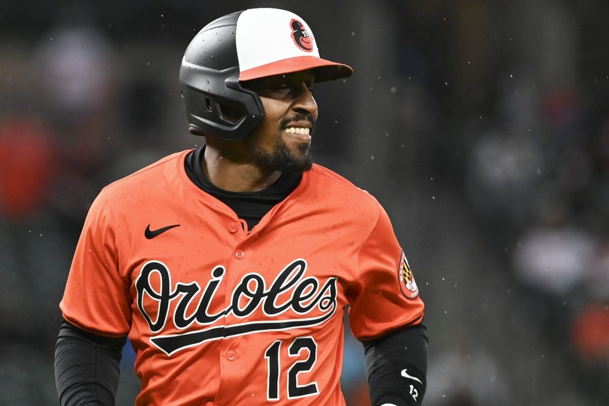 Mar 30, 2024; Baltimore, Maryland, USA;  Baltimore Orioles second baseman Tony Kemp (12)  runs to the dug out after a eighth inning at-bat against the Los Angeles Angels  at Oriole Park at Camden Yards. Mandatory Credit: Tommy Gilligan-Imagn Images