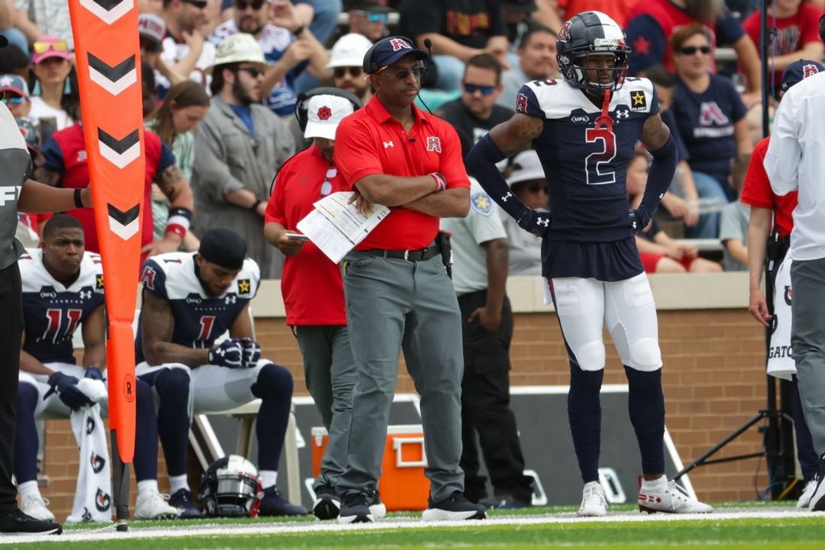 Mar 31, 2024; Houston, TX, USA; Houston Roughnecks head coach CJ Johnson stands on the sideline in the third quarter of a game against the Memphis Showboats at Rice Stadium. Mandatory Credit: Joseph Buvid-Imagn Images
