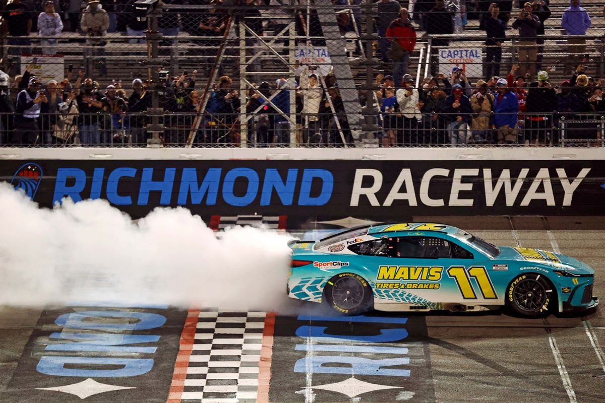 Mar 31, 2024; Richmond, Virginia, USA; NASCAR Cup Series driver Denny Hamlin (11) celebrates after winning the Toyota Owners 400 at Richmond Raceway. Mandatory Credit: Peter Casey-USA TODAY Sports