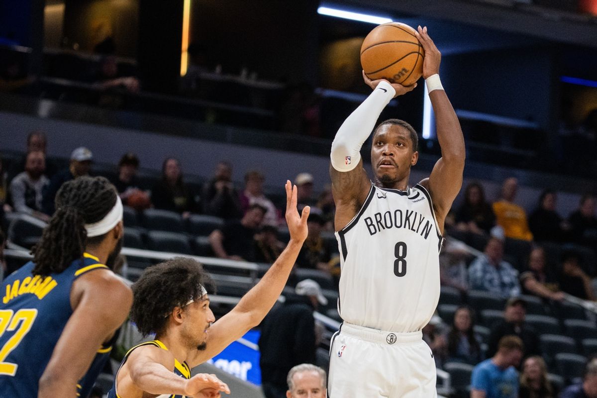 Apr 1, 2024; Indianapolis, Indiana, USA; Brooklyn Nets guard Lonnie Walker IV (8) shoots the ball while Indiana Pacers guard Kendall Brown (10) defends in the second half at Gainbridge Fieldhouse. Mandatory Credit: Trevor Ruszkowski-Imagn Images