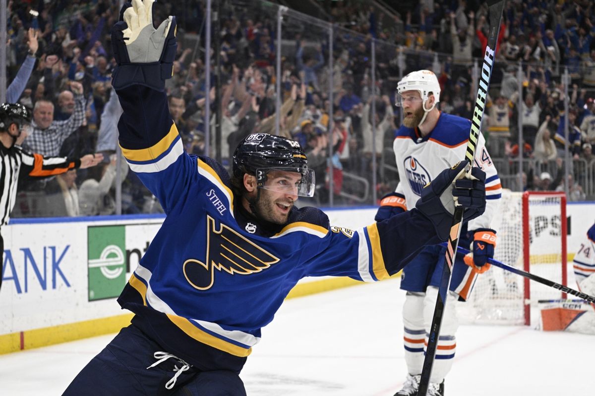 Apr 1, 2024; St. Louis, Missouri, USA; St. Louis Blues left wing Brandon Saad (20) reacts after scoring the game winning goal against the Edmonton Oilers in overtime at Enterprise Center. Mandatory Credit: Jeff Le-Imagn Images