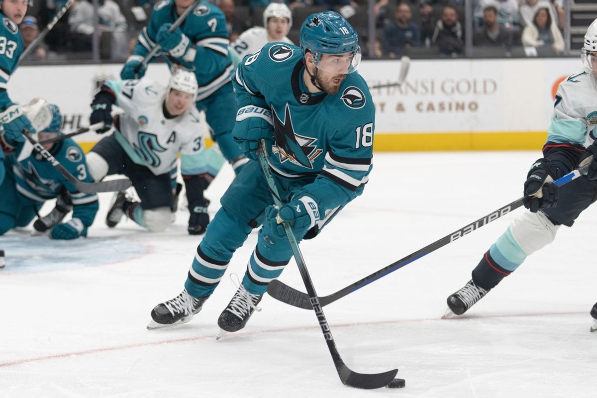 Apr 1, 2024; San Jose, California, USA;  San Jose Sharks right wing Filip Zadina (18) controls the puck during the third period against the Seattle Kraken at SAP Center at San Jose. Mandatory Credit: Stan Szeto-USA TODAY Sports