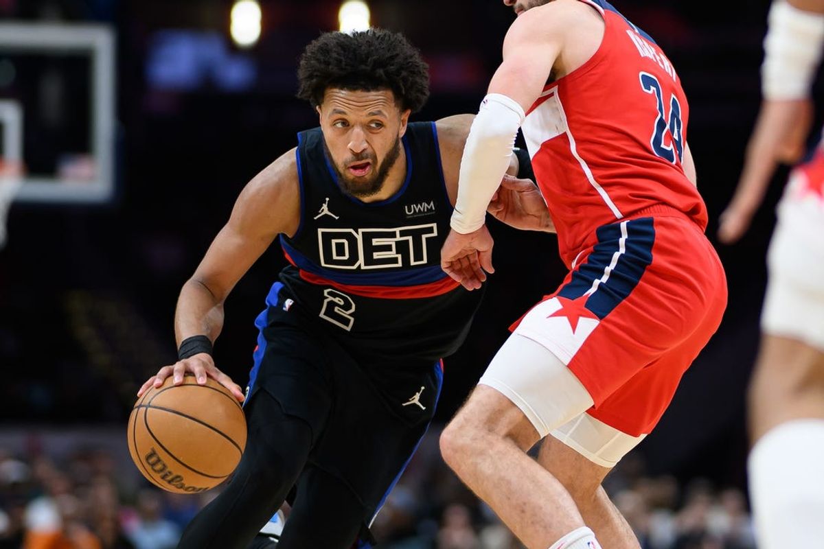 Mar 29, 2024; Washington, District of Columbia, USA; Detroit Pistons guard Cade Cunningham (2) brings the ball up court against Washington Wizards forward Corey Kispert (24) during the third quarter at Capital One Arena. Mandatory Credit: Reggie Hildred-USA TODAY Sports
