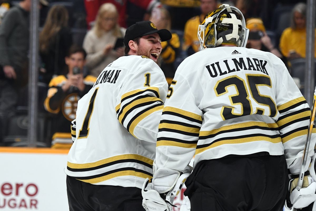 Apr 2, 2024; Nashville, Tennessee, USA; Boston Bruins goaltender Linus Ullmark (35) celebrates with goaltender Jeremy Swayman (1) after a win against the Nashville Predators at Bridgestone Arena. Mandatory Credit: Christopher Hanewinckel-Imagn Images