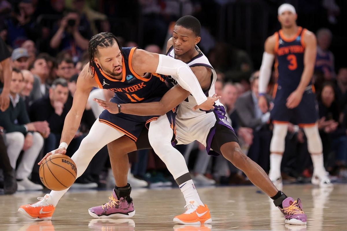 Apr 4, 2024; New York, New York, USA; New York Knicks guard Jalen Brunson (11) handles the ball against Sacramento Kings guard De'Aaron Fox (5) during the fourth quarter at Madison Square Garden. Mandatory Credit: Brad Penner-Imagn Images