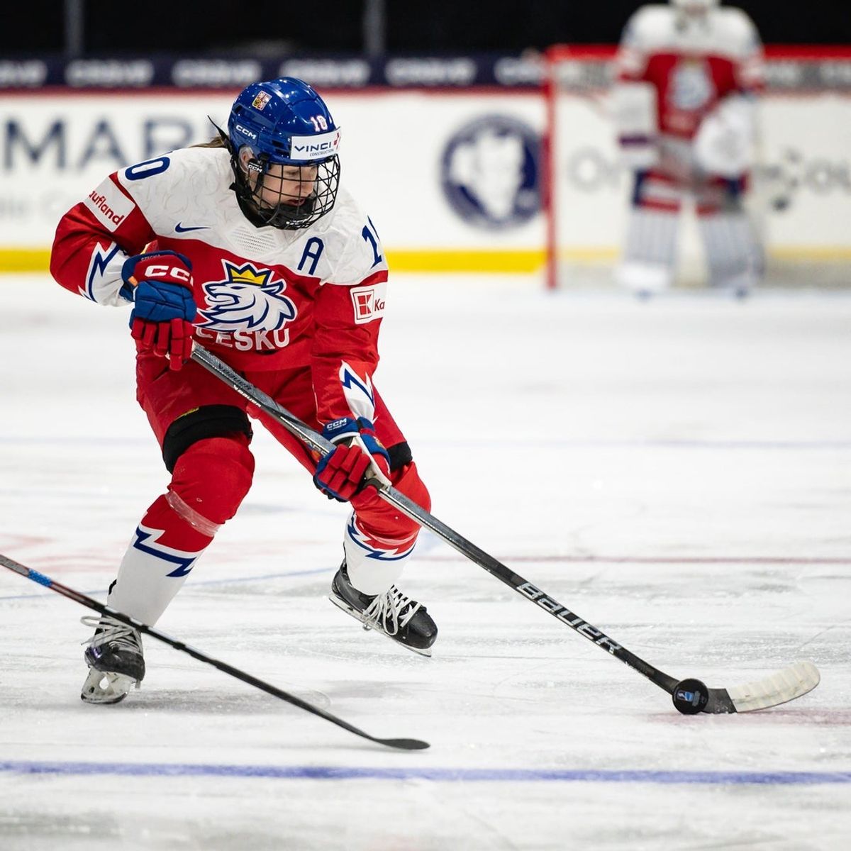 Czechia's Denisa Krizova controls the puck at the Adirondack Bank Center in Utica, NY on Friday, April 5, 2024.