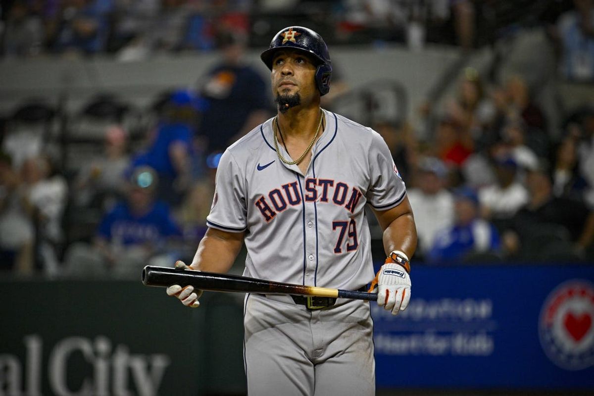 Apr 5, 2024; Arlington, Texas, USA; Houston Astros first base Jose Abreu (79) reacts to striking out against the Texas Rangers during the game at Globe Life Field. Mandatory Credit: Jerome Miron-USA TODAY Sports