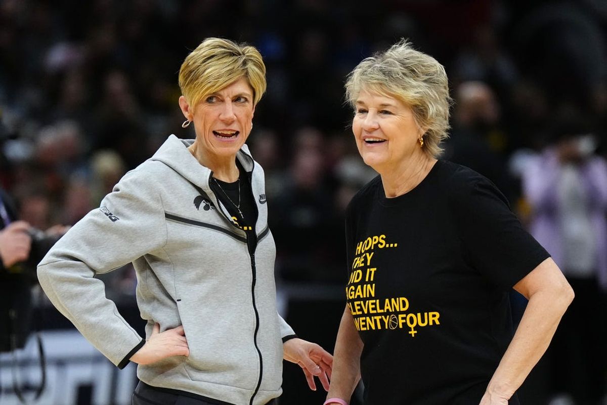 Apr 6, 2024; Cleveland, OH, USA; Iowa Hawkeyes head coach Lisa Bluder (right) and associate head coach Jan Jensen react during practice at Rocket Mortgage FieldHouse. Mandatory Credit: Kirby Lee-USA TODAY Sports