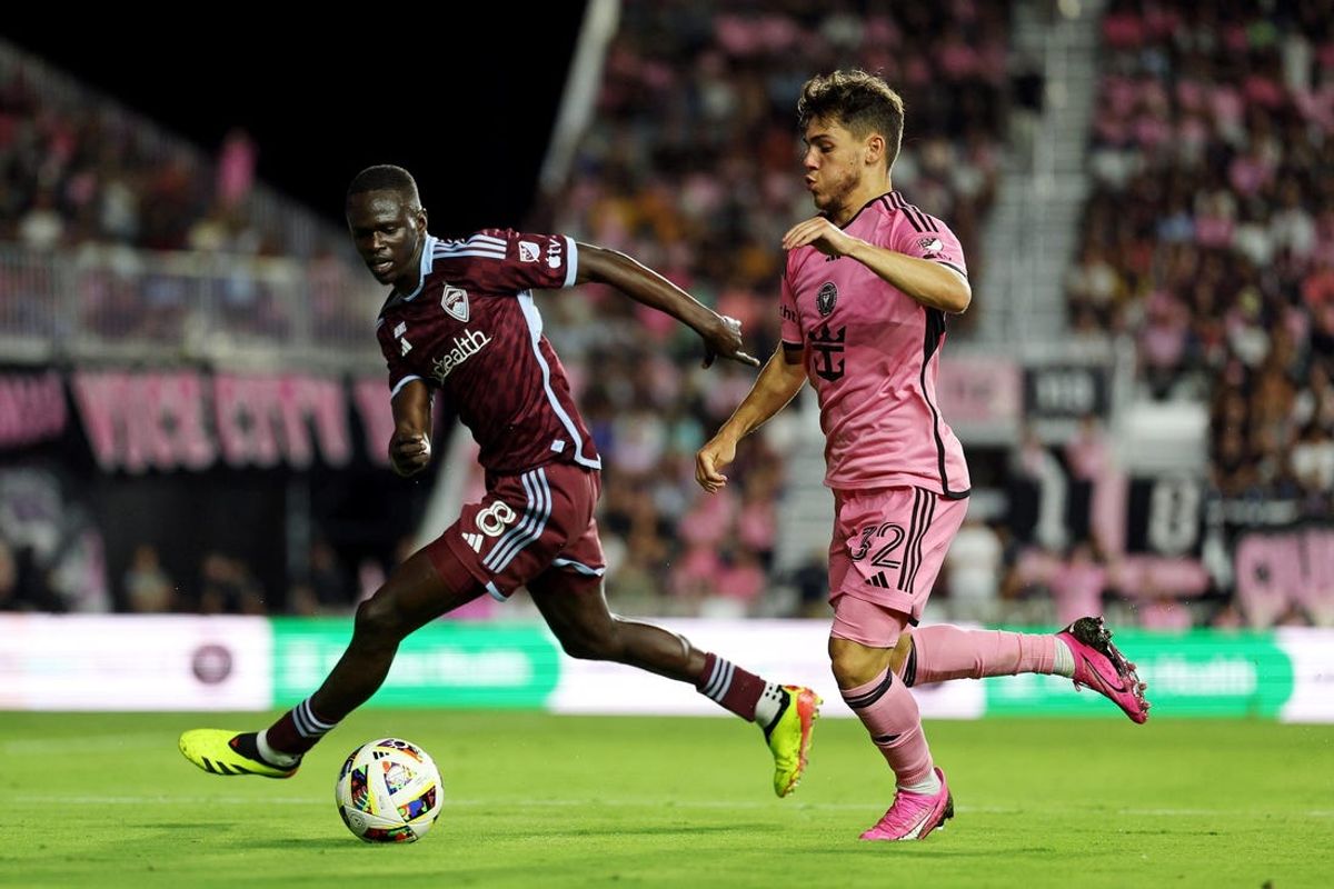 Apr 6, 2024; Fort Lauderdale, Florida, USA; Inter Miami CF defender Noah Allen (32) moves the ball against Colorado Rapids midfielder Lamine Diack (8) during the second half at Chase Stadium. Mandatory Credit: Nathan Ray Seebeck-USA TODAY Sports