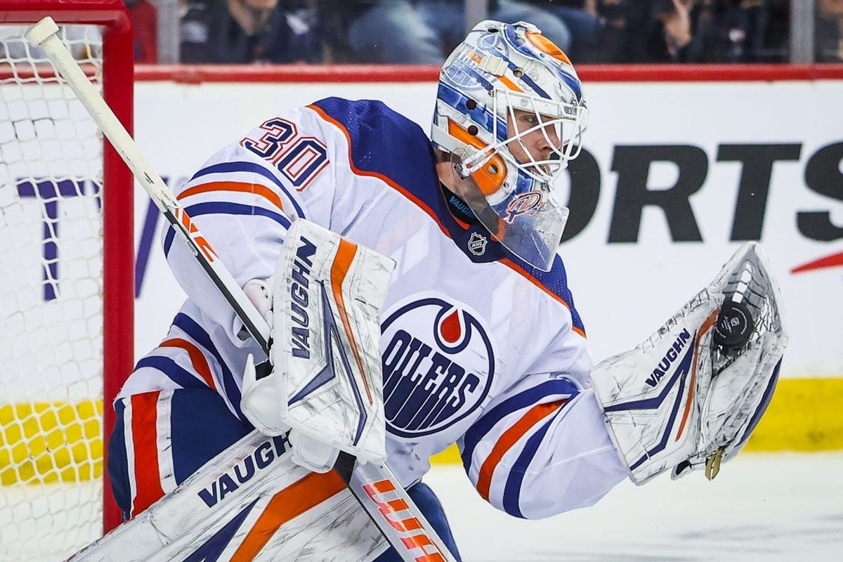 Apr 6, 2024; Calgary, Alberta, CAN; Edmonton Oilers goaltender Calvin Pickard (30) makes a save against the Calgary Flames during the second period at Scotiabank Saddledome. Mandatory Credit: Sergei Belski-USA TODAY Sports