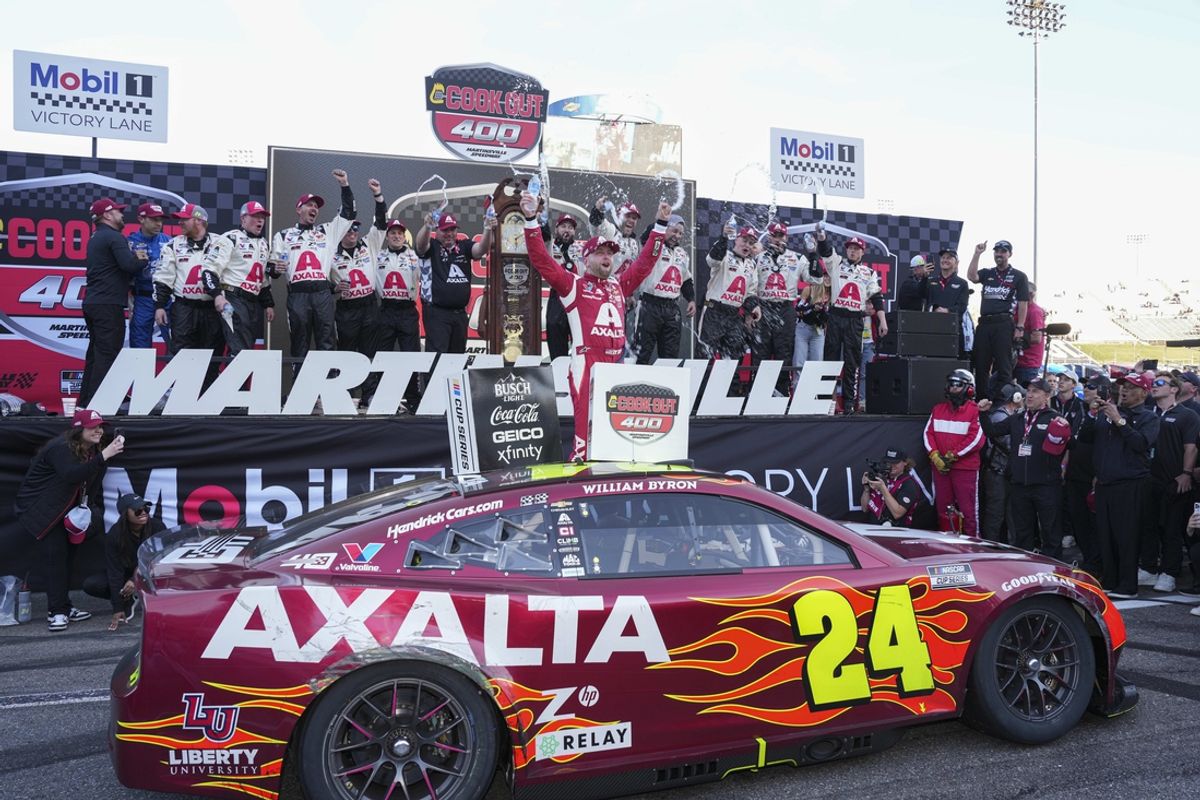 Apr 7, 2024; Martinsville, Virginia, USA;  NASCAR Cup Series driver William Byron (24) celebrates his win during the Cook Out 400 at Martinsville Speedway. Mandatory Credit: Jim Dedmon-Imagn Images