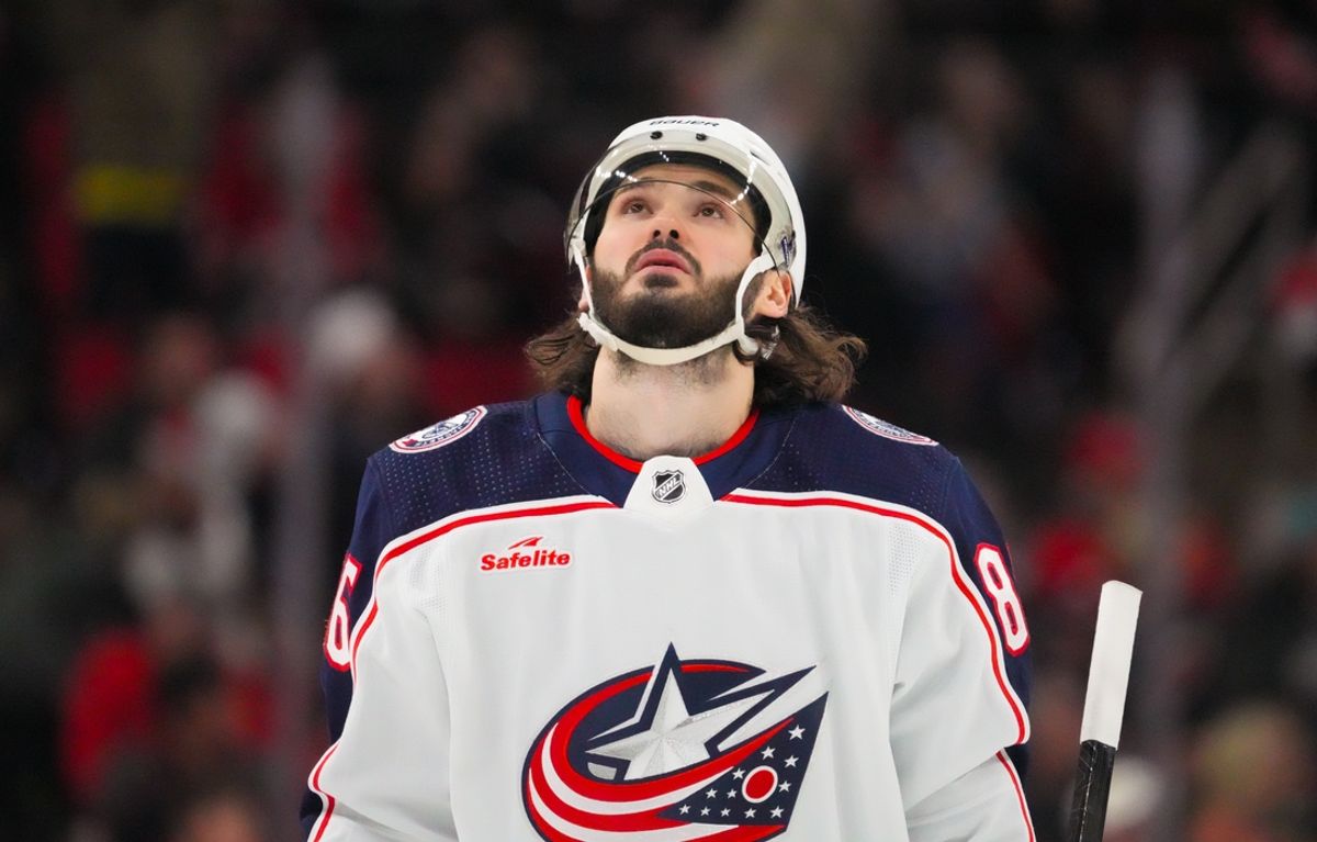 Apr 7, 2024; Raleigh, North Carolina, USA;  Columbus Blue Jackets right wing Kirill Marchenko (86) looks up against the Carolina Hurricanes during the first period at PNC Arena. Mandatory Credit: James Guillory-USA TODAY Sports