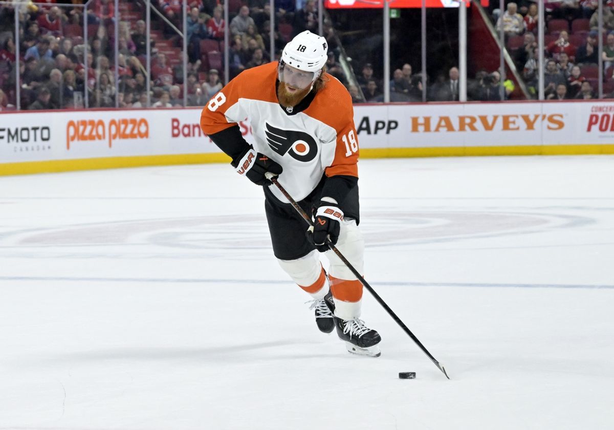 Apr 9, 2024; Montreal, Quebec, CAN; Philadelphia Flyers defenseman Marc Staal (18) plays the puck during the third period of the game against the Montreal Canadiens at the Bell Centre. Mandatory Credit: Eric Bolte-Imagn Images
