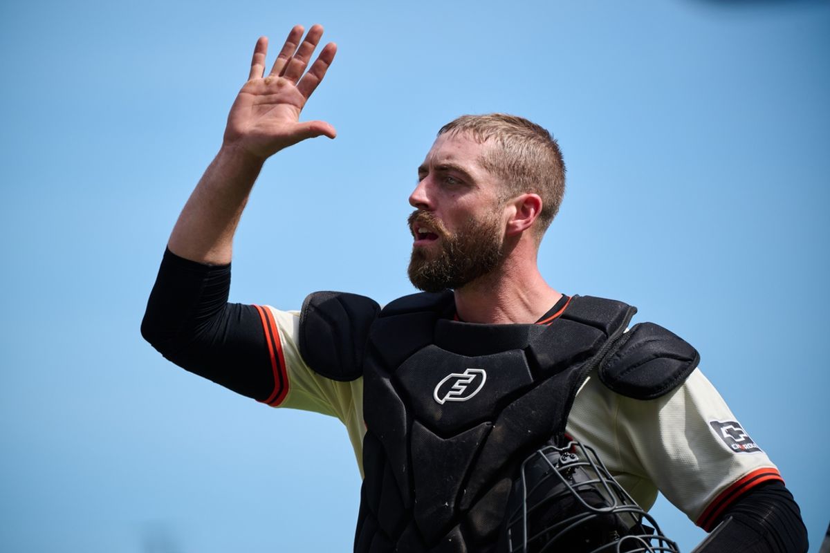 Apr 10, 2024; San Francisco, California, USA; San Francisco Giants catcher Tom Murphy (19) shakes hands with a teammate after the final out of the ninth inning against the Washington Nationals at Oracle Park. Mandatory Credit: Robert Edwards-Imagn Images