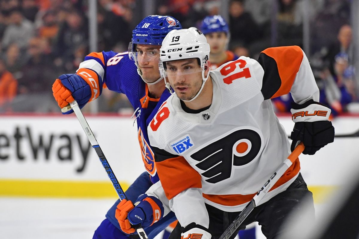 Apr 1, 2024; Philadelphia, Pennsylvania, USA; Philadelphia Flyers right wing Garnet Hathaway (19) and New York Islanders left wing Pierre Engvall (18) battle at Wells Fargo Center. Mandatory Credit: Eric Hartline-Imagn Images