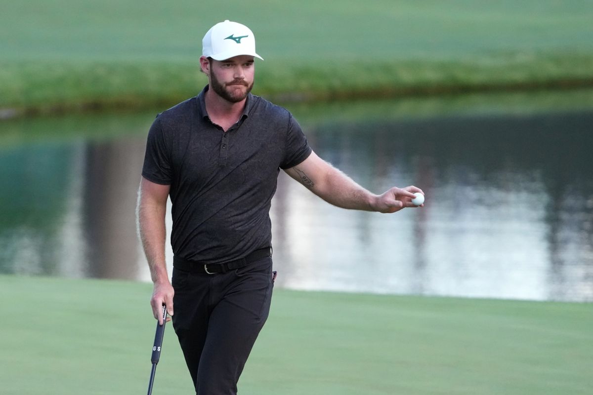 Apr 11, 2024; Augusta, Georgia, USA; Grayson Murray acknowledges the patrons after a putt on the 16th green during the first round of the Masters Tournament. Mandatory Credit: Kyle Terada-USA TODAY Sports