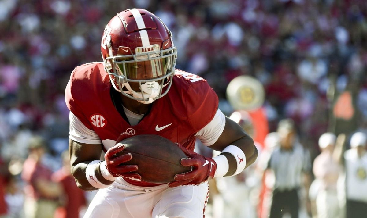 Apr 13, 2024; Tuscaloosa, AL, USA;  Alabama defensive back Dre Kirkpatrick Jr. (21) intercepts a pass during the A-Day scrimmage at Bryant-Denny Stadium. Mandatory Credit: Gary Cosby Jr.-Imagn Images