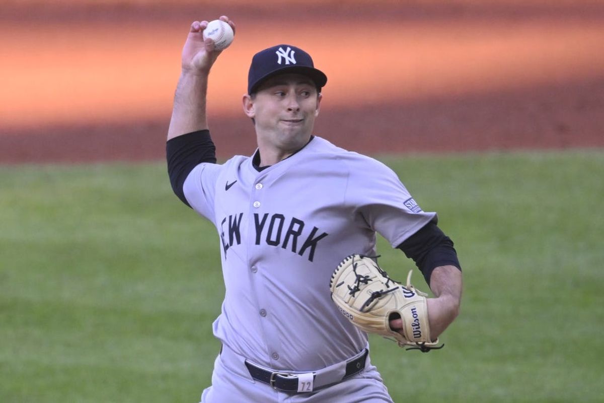 Apr 13, 2024; Cleveland, Ohio, USA; New York Yankees starting pitcher Cody Poteet (72) delivers a pitch in the first inning against the Cleveland Guardians at Progressive Field. Mandatory Credit: David Richard-USA TODAY Sports