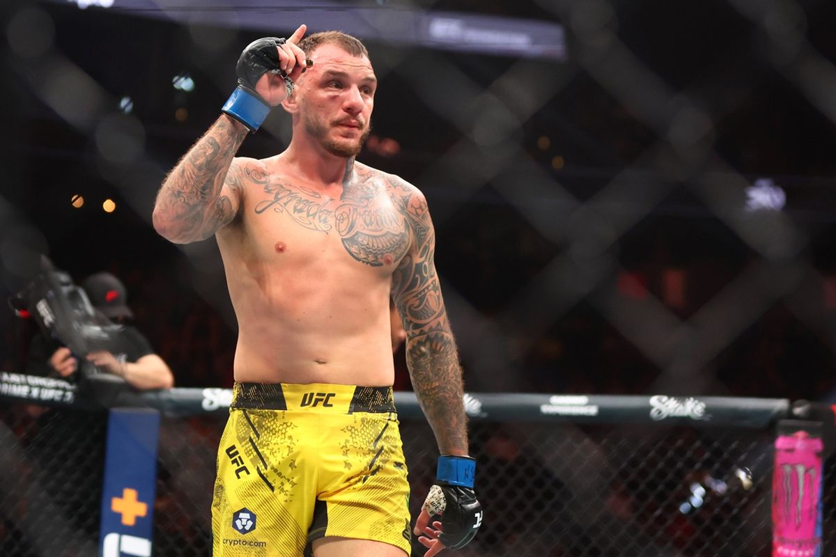 Apr 13, 2024; Las Vegas, Nevada, USA; Renato Moicano (blue gloves) reacts after defeating Jalin Turner (not pictured) during UFC 300 at T-Mobile Arena. Mandatory Credit: Mark J. Rebilas-Imagn Images