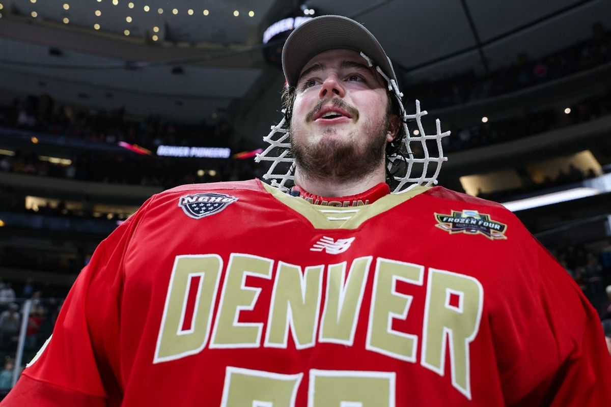 Apr 13, 2024; Saint Paul, Minnesota, USA; Denver Pioneers goaltender Matt Davis (35) celebrates his teams win against the Boston College Eagles after the championship game of the 2024 Frozen Four college ice hockey tournament at Xcel Energy Center. Mandatory Credit: Matt Krohn-Imagn Images