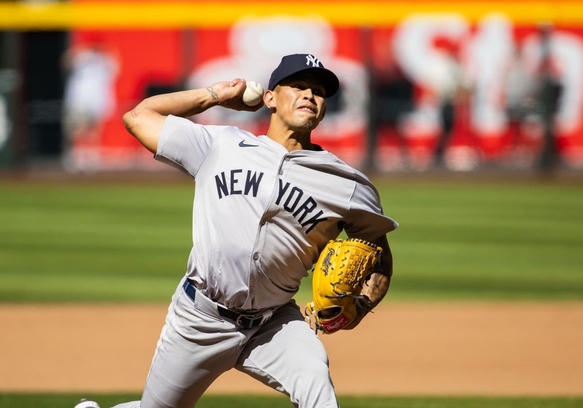 Apr 3, 2024; Phoenix, Arizona, USA; New York Yankees pitcher Jonathan Loaisiga against the Arizona Diamondbacks at Chase Field. Mandatory Credit: Mark J. Rebilas-Imagn Images