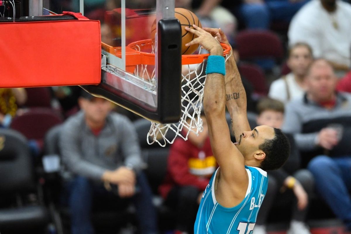 Apr 14, 2024; Cleveland, Ohio, USA; Charlotte Hornets guard Amari Bailey (10) dunks in the fourth quarter against the Cleveland Cavaliers at Rocket Mortgage FieldHouse. Mandatory Credit: David Richard-Imagn Images