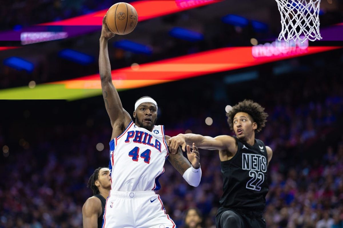 Apr 14, 2024; Philadelphia, Pennsylvania, USA; Philadelphia 76ers forward Paul Reed (44) reaches for a ball past Brooklyn Nets forward Jalen Wilson (22) during the fourth quarter at Wells Fargo Center. Mandatory Credit: Bill Streicher-USA TODAY Sports
