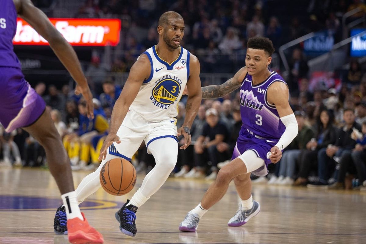 Apr 14, 2024; San Francisco, California, USA; Golden State Warriors guard Chris Paul (3) drives past Utah Jazz guard Keynote George (3) during the first quarter at Chase Center. Mandatory Credit: D. Ross Cameron-USA TODAY Sports