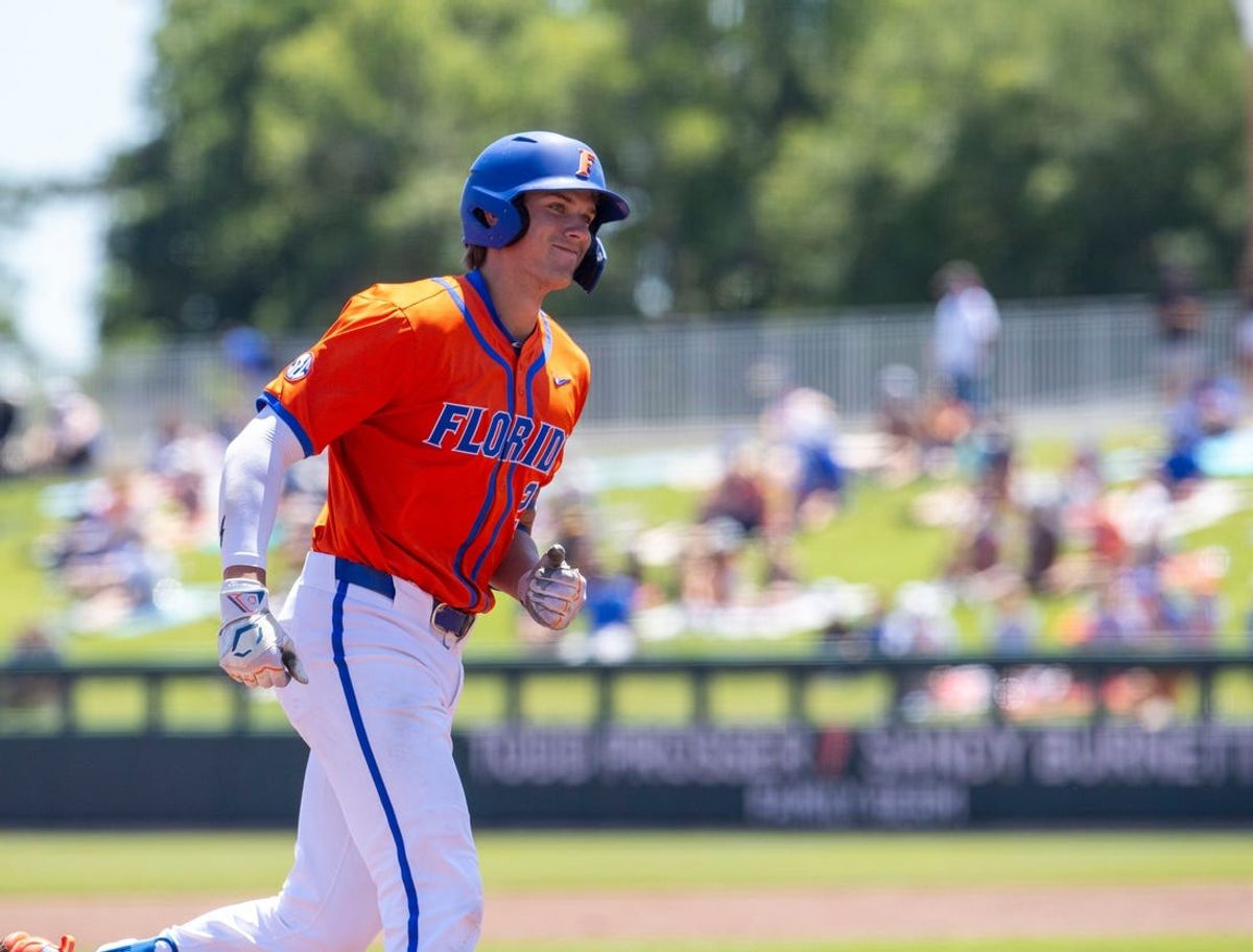 Gators catcher Brody Donay (29)with a two run homer in the bottom of the second inning against South Carolina. The Gators ended their six game losing streak with an 11-9 win over the Gamecocks in Game 3 of the weekend series at Condron Family Ballpark in Gainesville, Florida, Sunday, April 14, 2024. [Cyndi Chambers/ Gainesville Sun] 2024