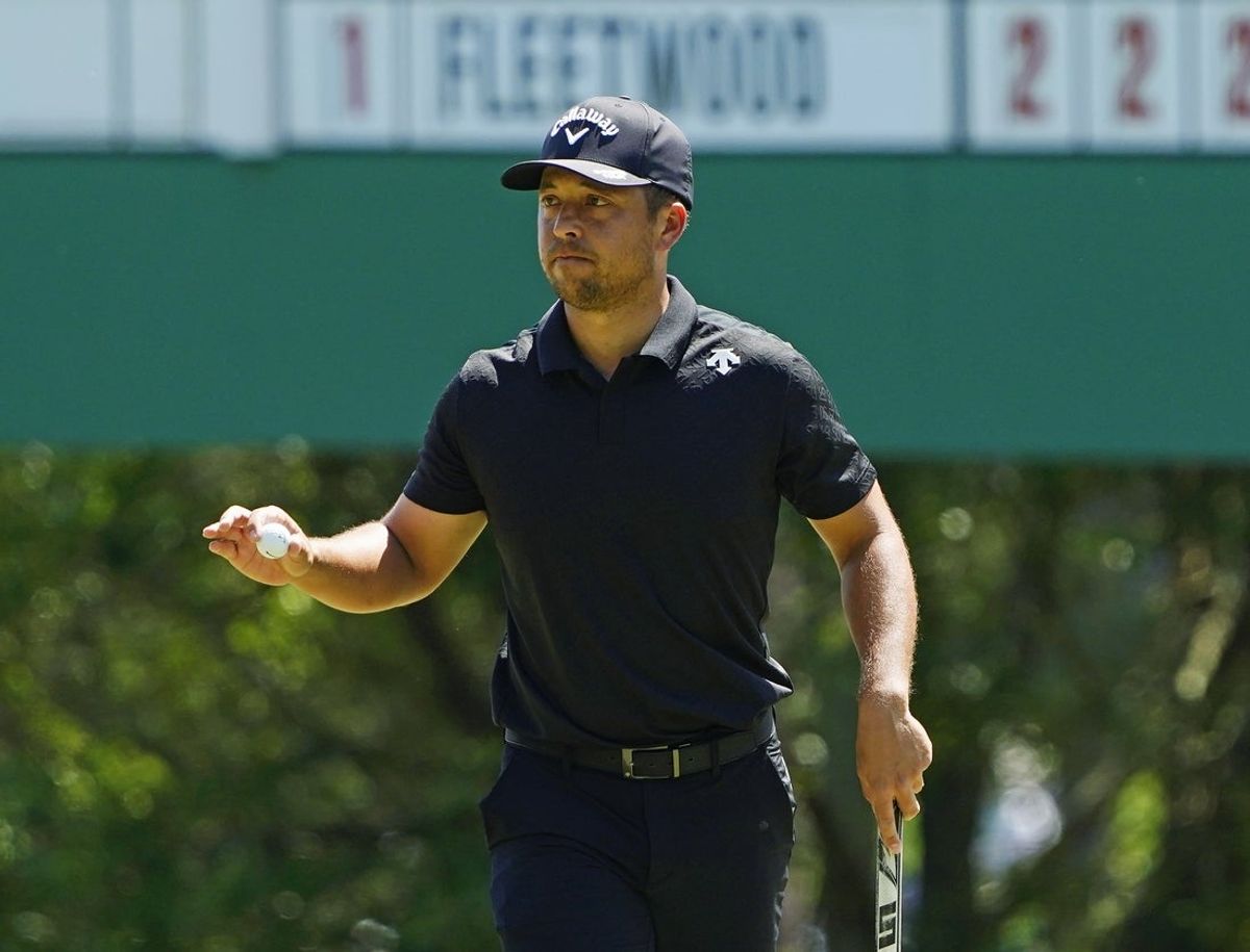 Apr 14, 2024; Augusta, Georgia, USA; Xander Schauffele walks off the No. 3 green during the final round of the Masters Tournament. Mandatory Credit: Katie Goodale-USA TODAY Network