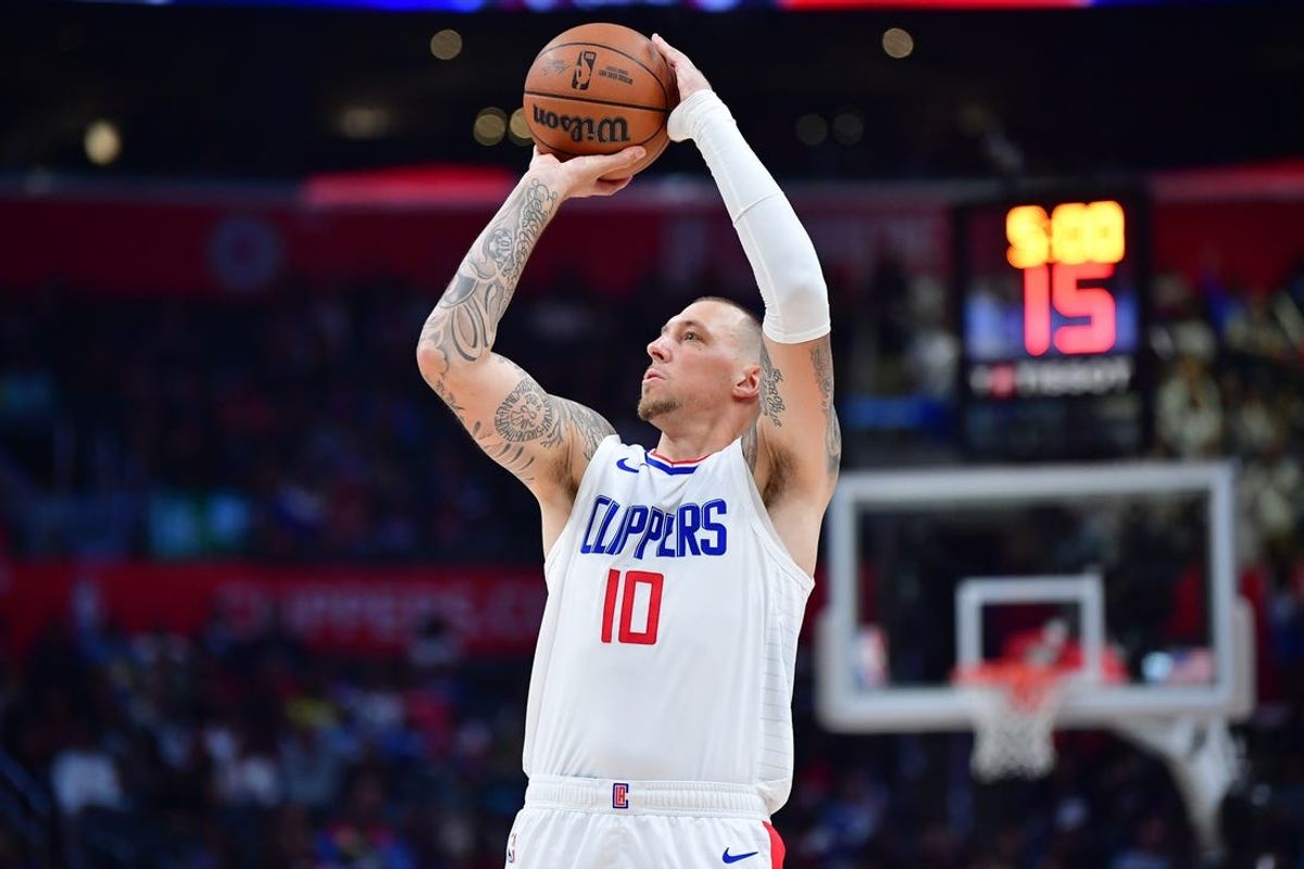 Apr 14, 2024; Los Angeles, California, USA; Los Angeles Clippers center Daniel Theis (10) shoots against the Houston Rockets during the second half at Crypto.com Arena. Mandatory Credit: Gary A. Vasquez-USA TODAY Sports