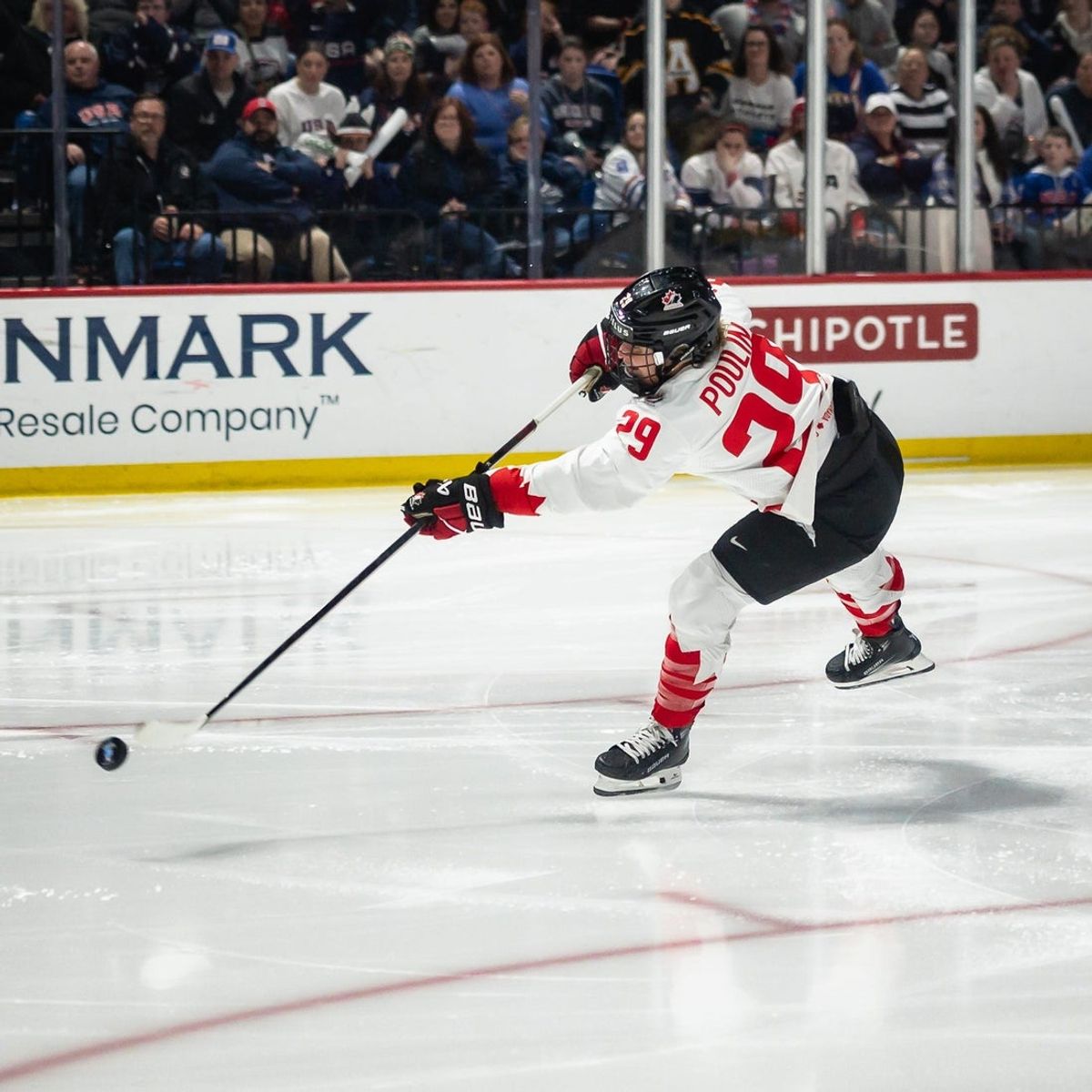 Canada's Marie-Philip Poulin shoots the puck at the Adirondack Bank Center in Utica, NY on Sunday, April 14, 2024.