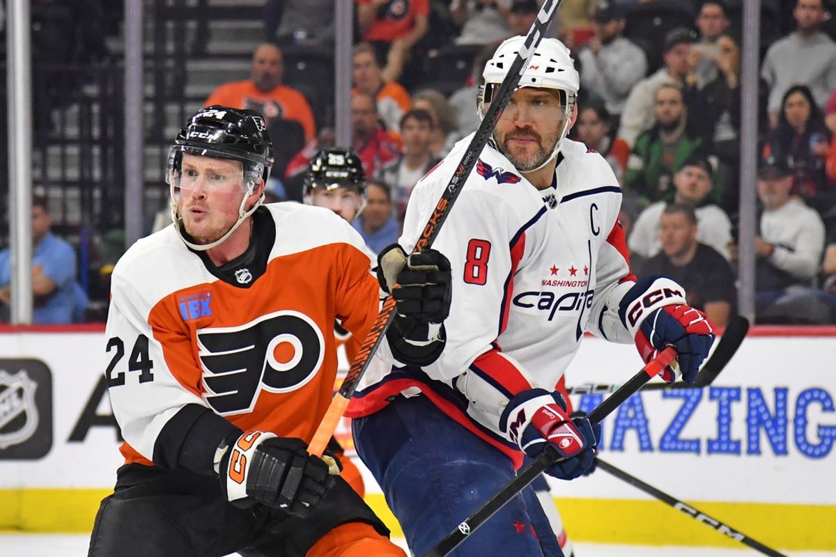 Apr 16, 2024; Philadelphia, Pennsylvania, USA; Philadelphia Flyers defenseman Nick Seeler (24) and Washington Capitals left wing Alex Ovechkin (8) battle for position during the first period at Wells Fargo Center. Mandatory Credit: Eric Hartline-Imagn Images