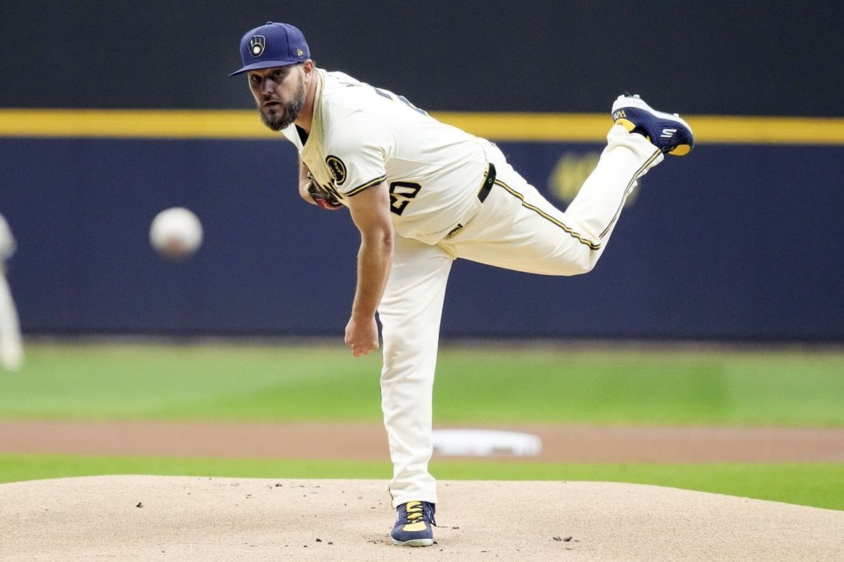 Apr 16, 2024; Milwaukee, Wisconsin, USA;  Milwaukee Brewers pitcher Wade Miley (20) throws a pitch during the first inning against the San Diego Padres at American Family Field. Mandatory Credit: Jeff Hanisch-Imagn Images