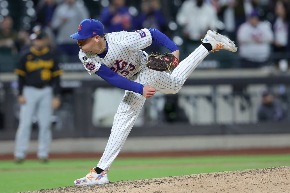 Apr 16, 2024; New York City, New York, USA; New York Mets pitcher Drew Smith (33) follows through on a pitch against the Pittsburgh Pirates during the ninth inning at Citi Field. Mandatory Credit: Brad Penner-Imagn Images