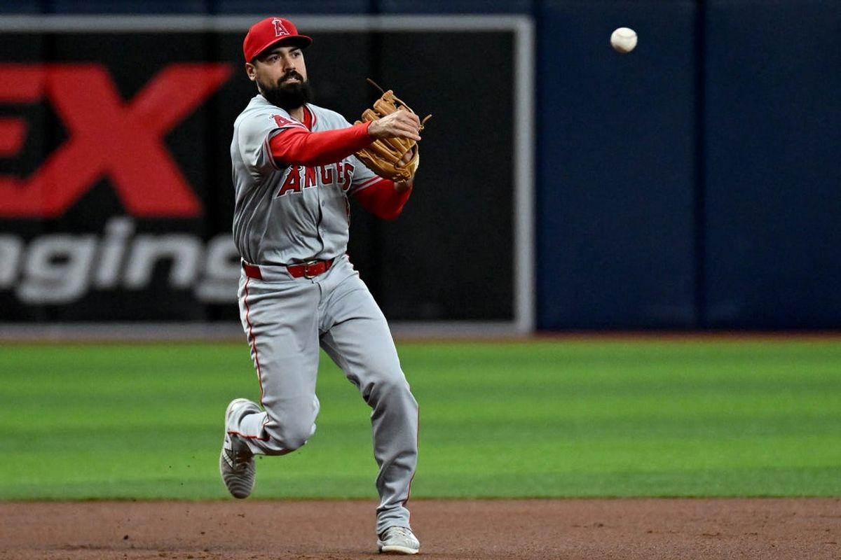 Apr 17, 2024; St. Petersburg, Florida, USA; Los Angeles Angels third baseman Anthony Rendon (6) throws to first base in the first inning against the Tampa Bay Rays  at Tropicana Field. Mandatory Credit: Jonathan Dyer-USA TODAY Sports