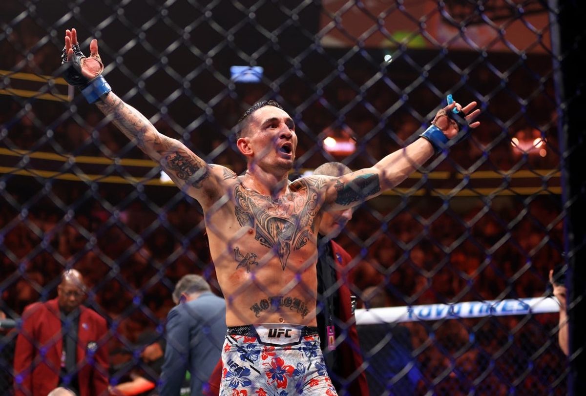 Apr 13, 2024; Las Vegas, Nevada, USA; Max Holloway celebrates after knocking out Justin Gaethje (not pictured) during UFC 300 at T-Mobile Arena. Mandatory Credit: Mark J. Rebilas-Imagn Images