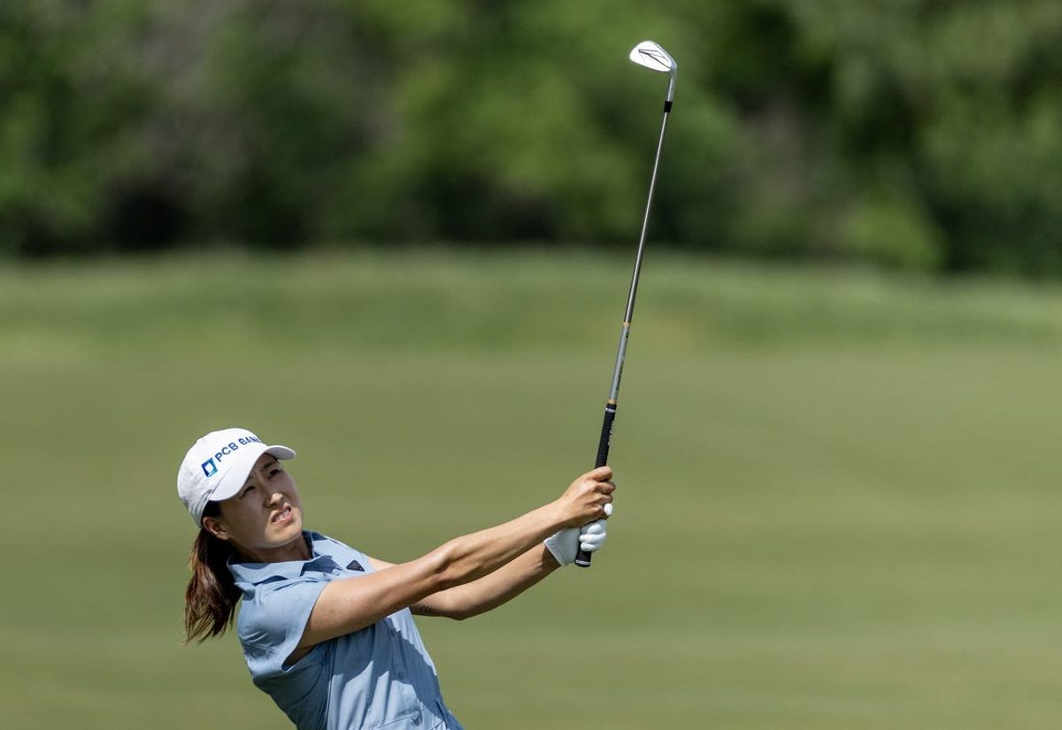 Apr 18, 2024; The Woodlands, Texas, USA; Lilia Vu (USA) hits her approach shot on the 16th fairway during the first round of The Chevron Championship golf tournament. Mandatory Credit: Thomas Shea-USA TODAY Sports