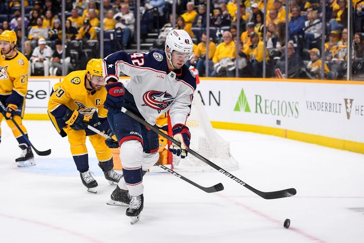 Apr 13, 2024; Nashville, Tennessee, USA; Columbus Blue Jackets center Alexandre Texier (42) skates against the Nashville Predators during the second period at Bridgestone Arena. Mandatory Credit: Steve Roberts-USA TODAY Sports