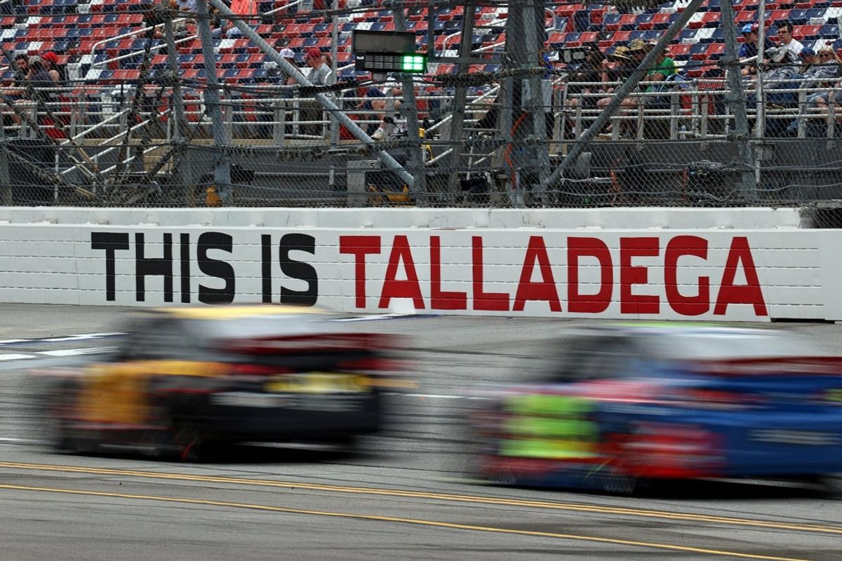 Apr 20, 2024; Talladega, Alabama, USA; The field goes by the start finish line at Talladega Superspeedway. Mandatory Credit: Peter Casey-Imagn Images