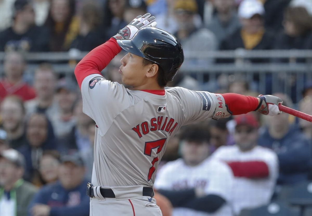 Apr 20, 2024; Pittsburgh, Pennsylvania, USA; Boston Red Sox designated hitter  Masataka Yoshida (7) hits a two run home run against he Pittsburgh Pirates during the sixth inning at PNC Park. Mandatory Credit: Charles LeClaire-USA TODAY Sports