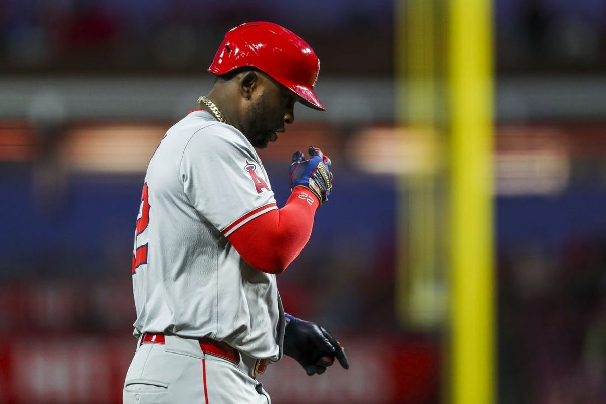 Apr 20, 2024; Cincinnati, Ohio, USA; Los Angeles Angels designated hitter Miguel Sano (22) reacts after hitting a two-run home run in the sixth inning against the Cincinnati Reds at Great American Ball Park. Mandatory Credit: Katie Stratman-USA TODAY Sports