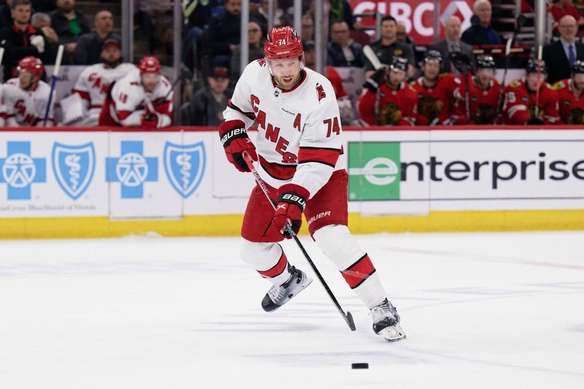 Apr 14, 2024; Chicago, Illinois, USA;  Carolina Hurricanes defenseman Jaccob Slavin (74) skates against the Chicago Blackhawks at United Center. Mandatory Credit: Jamie Sabau-USA TODAY Sports