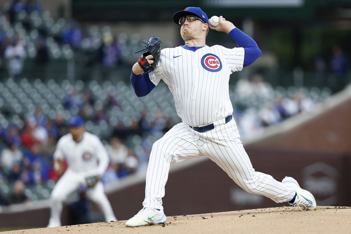 Apr 23, 2024; Chicago, Illinois, USA; Chicago Cubs starting pitcher Jordan Wicks (36) delivers a pitch against the Houston Astros during the first inning at Wrigley Field. Mandatory Credit: Kamil Krzaczynski-USA TODAY Sports