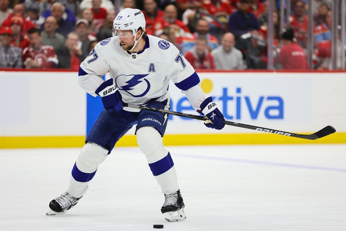 Apr 23, 2024; Sunrise, Florida, USA; Tampa Bay Lightning defenseman Victor Hedman (77) moves the puck against the Florida Panthers during the first period in game two of the first round of the 2024 Stanley Cup Playoffs at Amerant Bank Arena. Mandatory Credit: Sam Navarro-Imagn Images