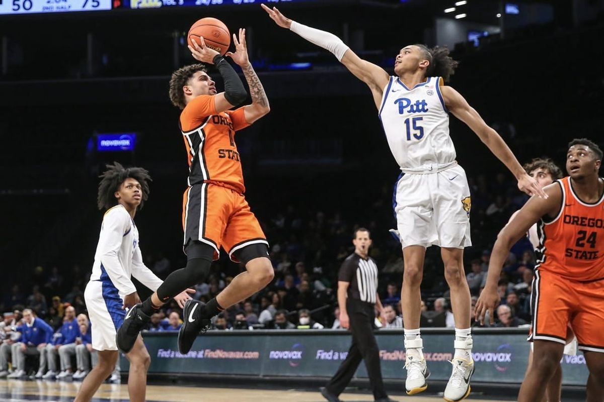 Nov 24, 2023; Brooklyn, NY, USA;  Oregon State Beavers guard Dexter Akanno (4) shoots the ball over Pittsburgh Panthers guard Jaland Lowe (15) in the second half at Barclay Center.
