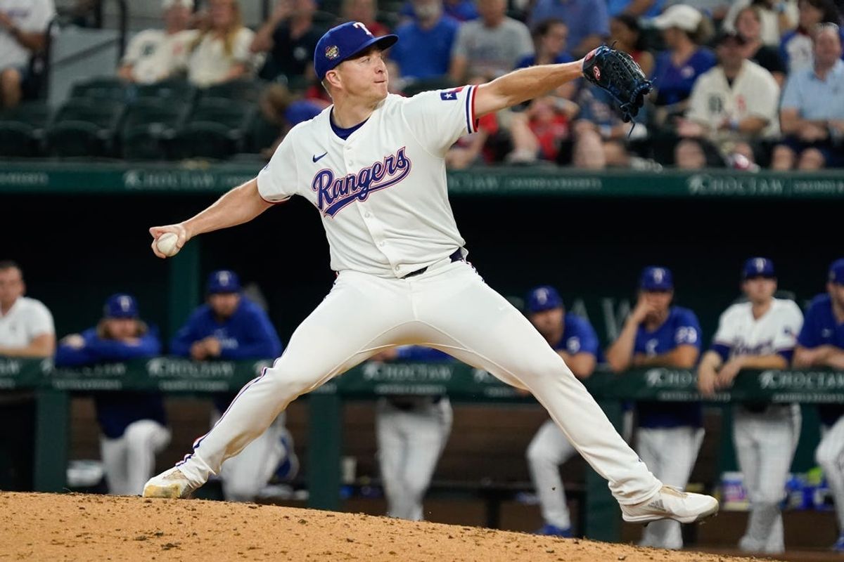 Apr 25, 2024; Arlington, Texas, USA; Texas Rangers pitcher Josh Sborz (66) throws to the plate during the ninth inning against the Seattle Mariners at Globe Life Field. Mandatory Credit: Raymond Carlin III-USA TODAY Sports