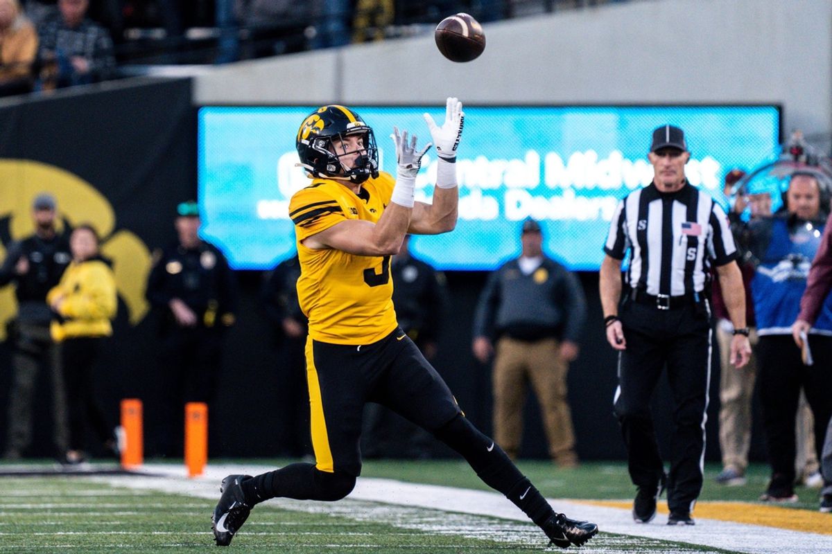 Iowa defensive back Cooper DeJean (3) catches a punt at Kinnick Stadium on Saturday, October 21, 2023 in Iowa City. DeJean returned the punt for a touchdown and it was later called back after review ruled he fair-caught the punt.